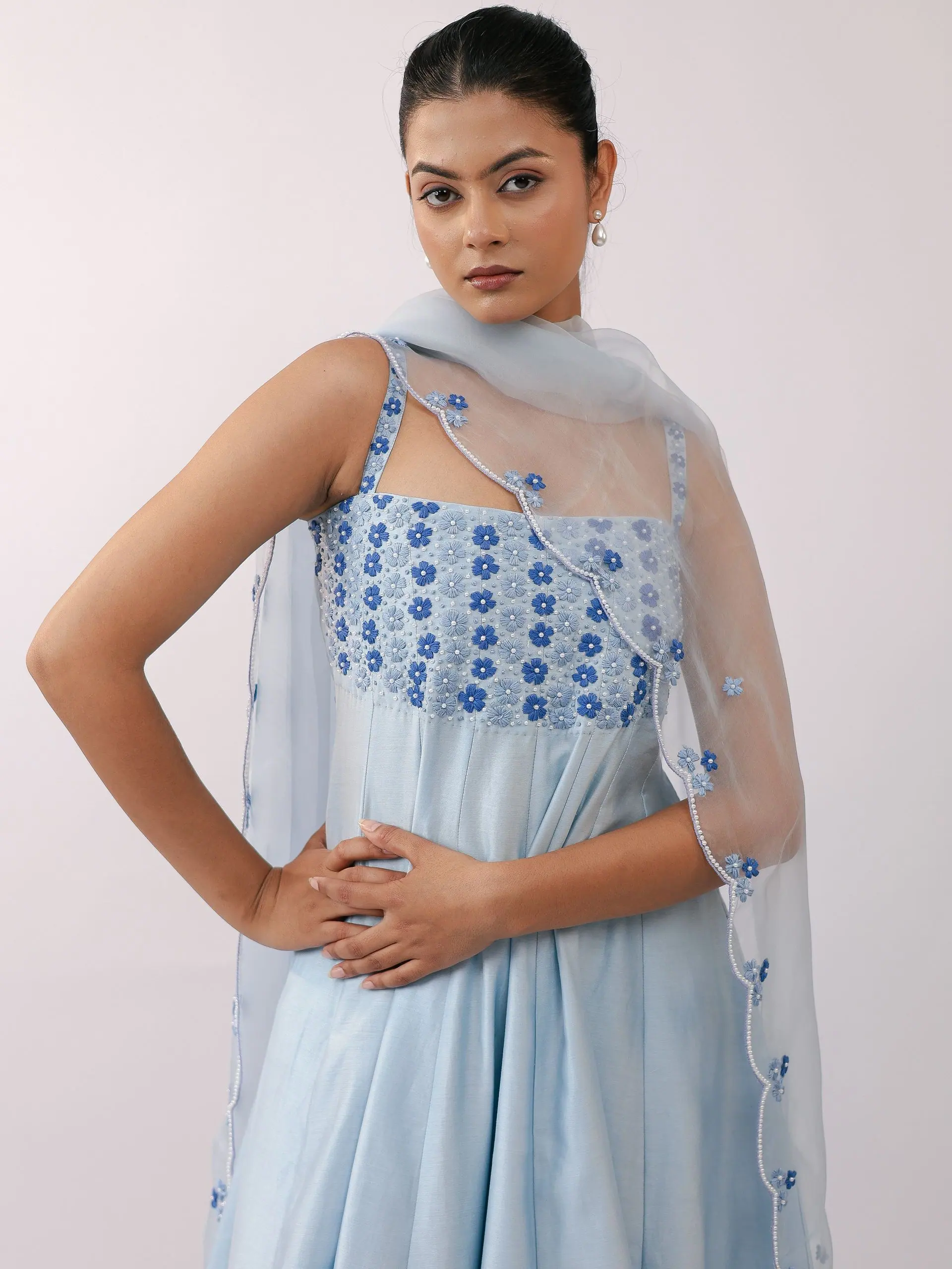 Powder-blue anarkali with blue floral yoke, waist-up