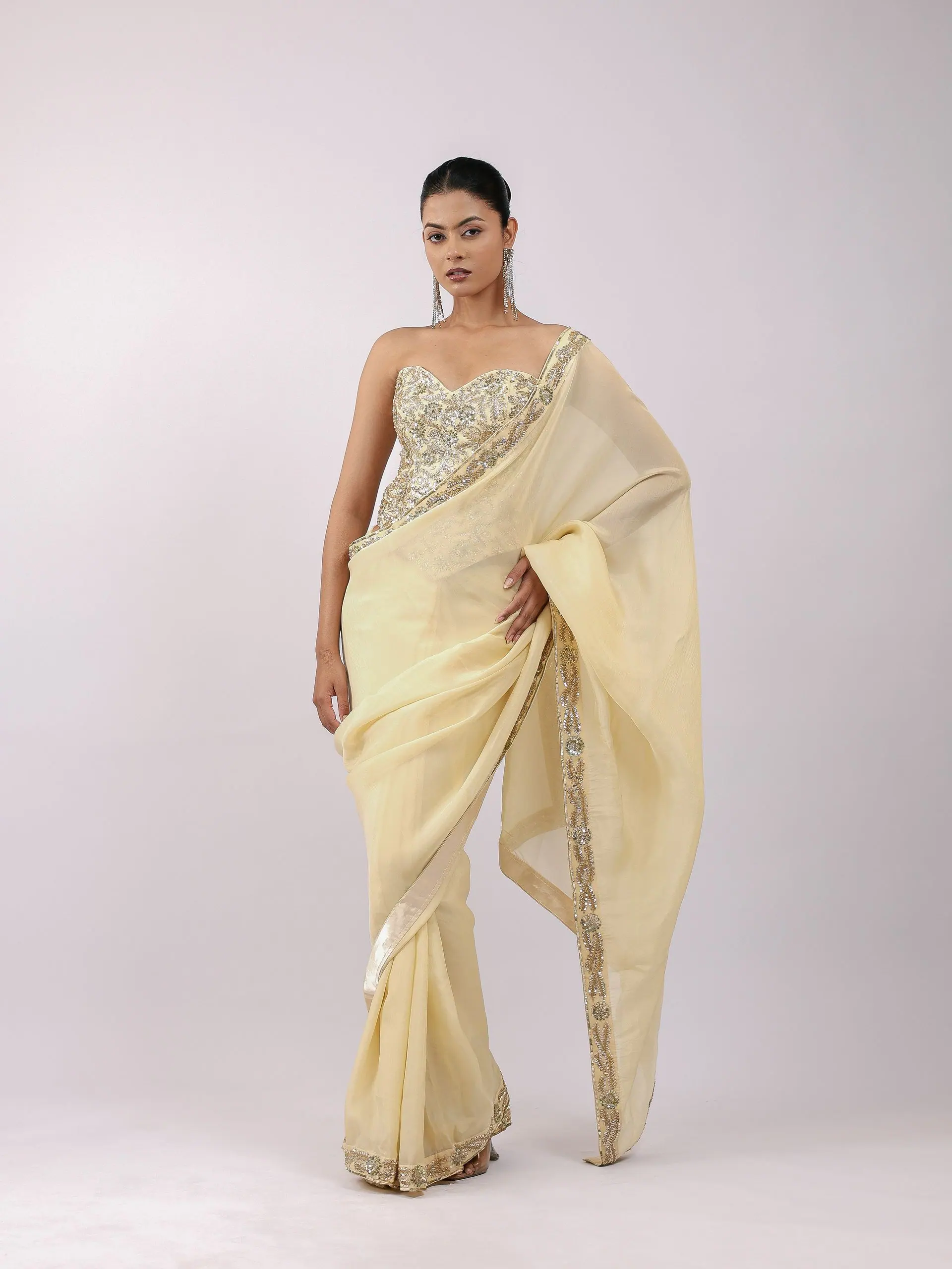 Buttercream saree with a hand-embroidered corset, full length