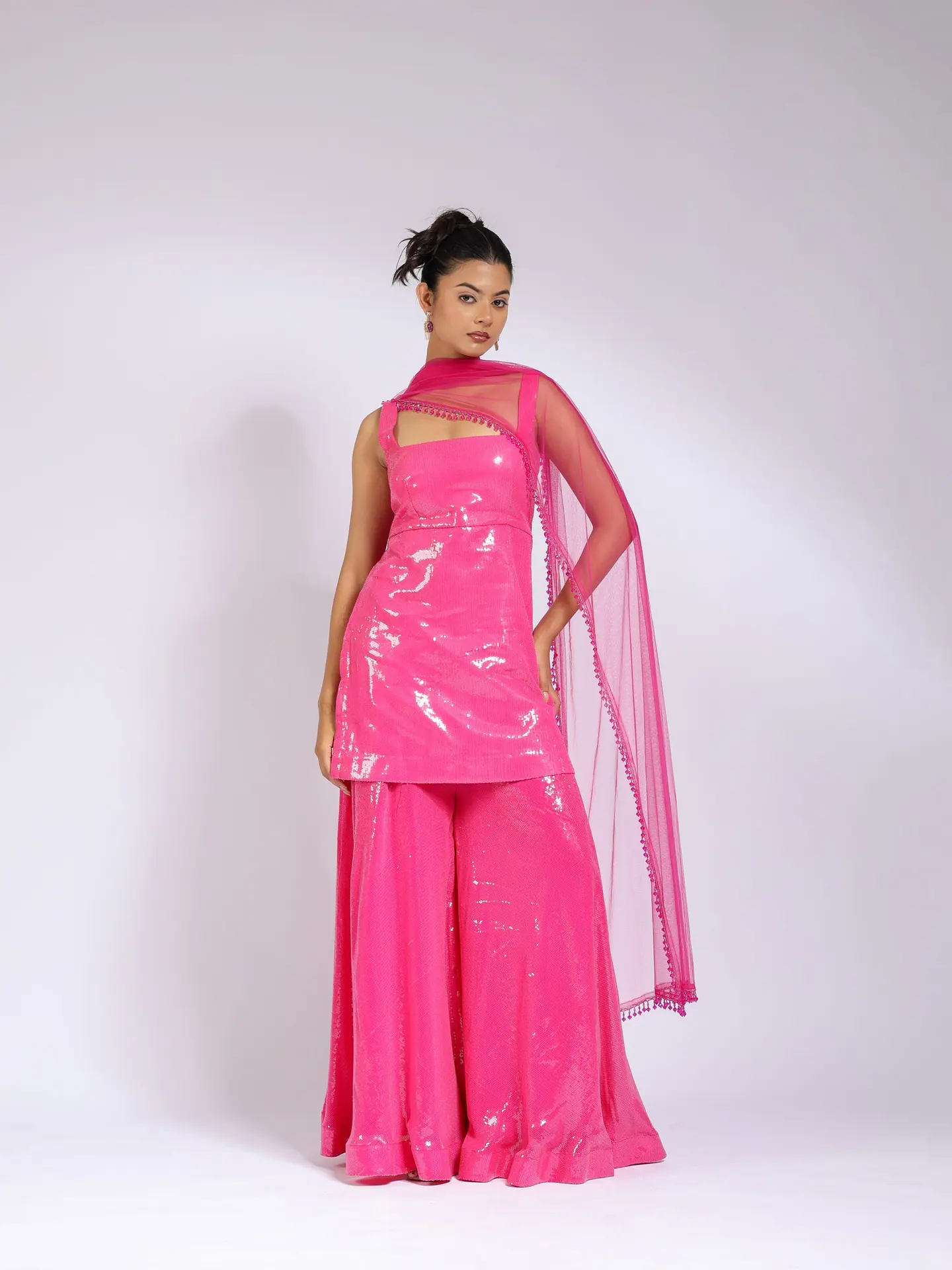 Hot-pink sequin kurta and sharara with a sheer pink dupatta, full length