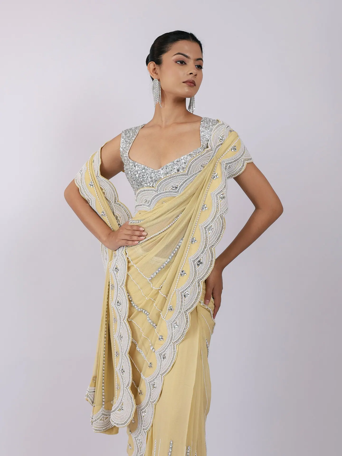 Lemon saree with embellished blouse, waist-up
