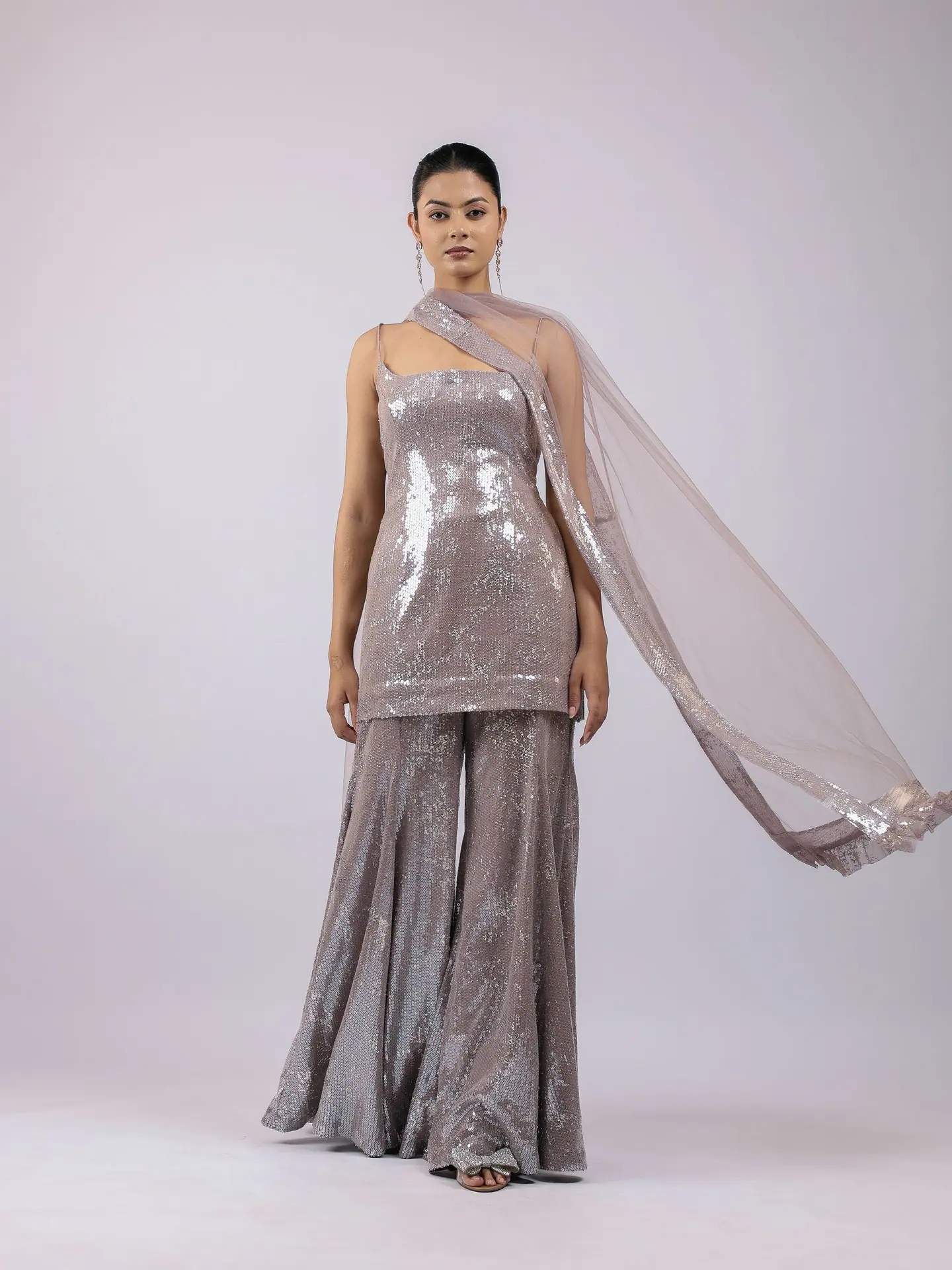 Pewter sequin set with the dupatta lifted wide