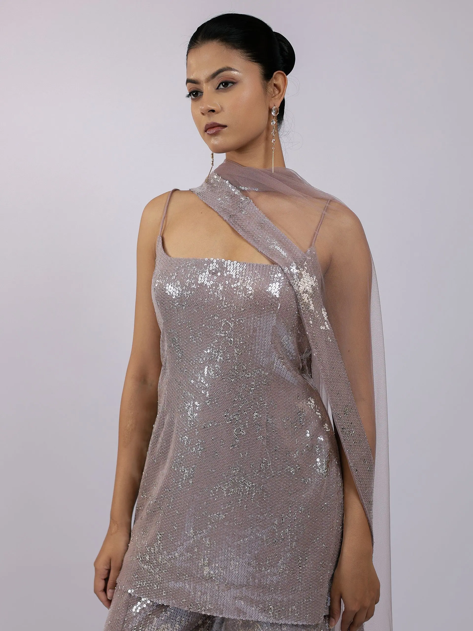 Pewter sequin kurta with dupatta at the neck, portrait