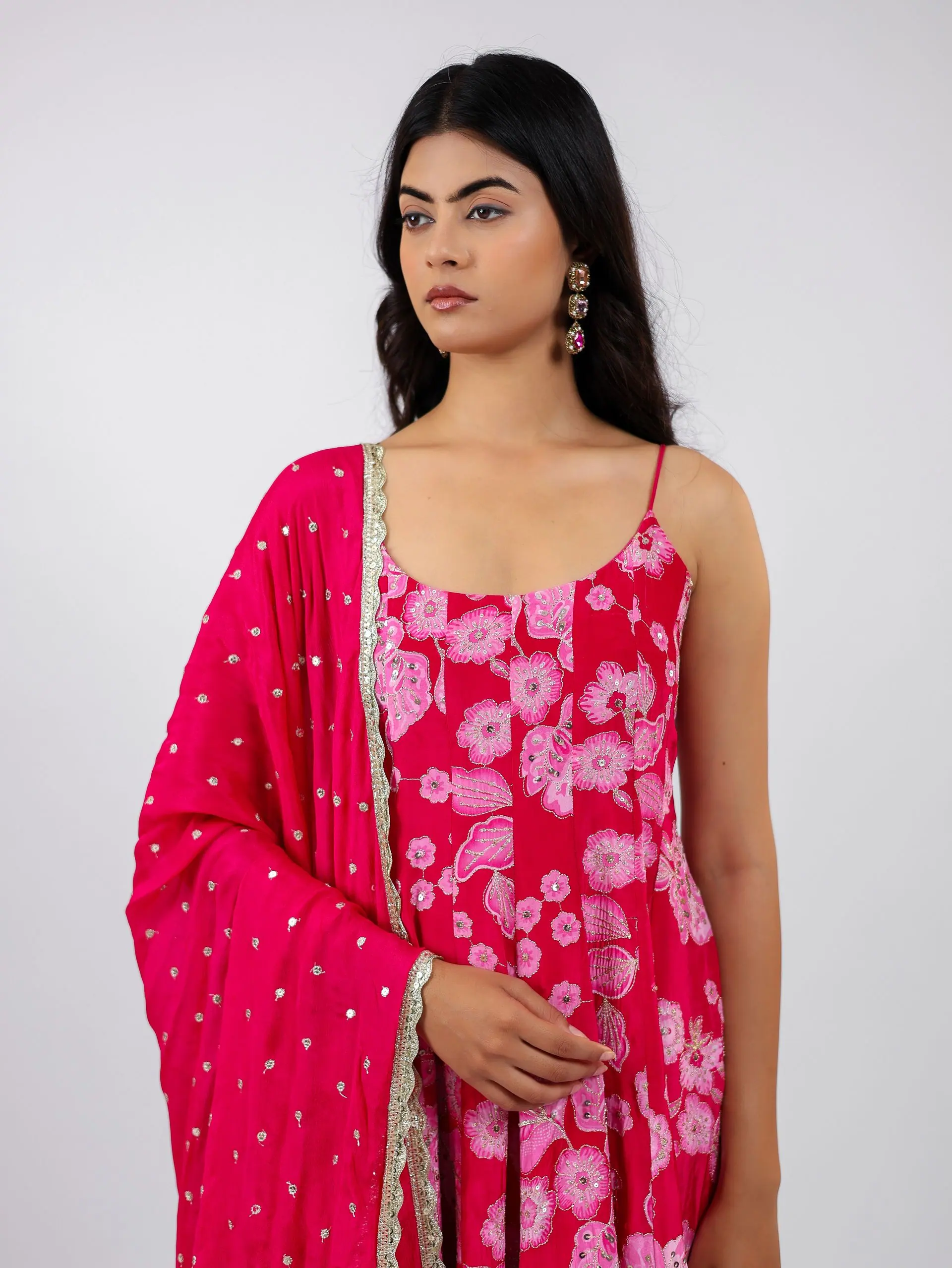 Rani-pink anarkali with dupatta at the shoulder, portrait