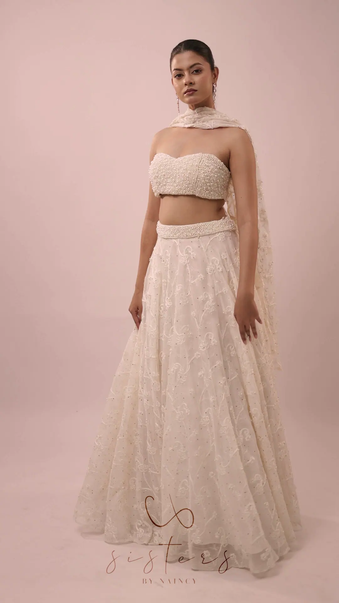 Moti — Ivory lehenga with pearl bustier
