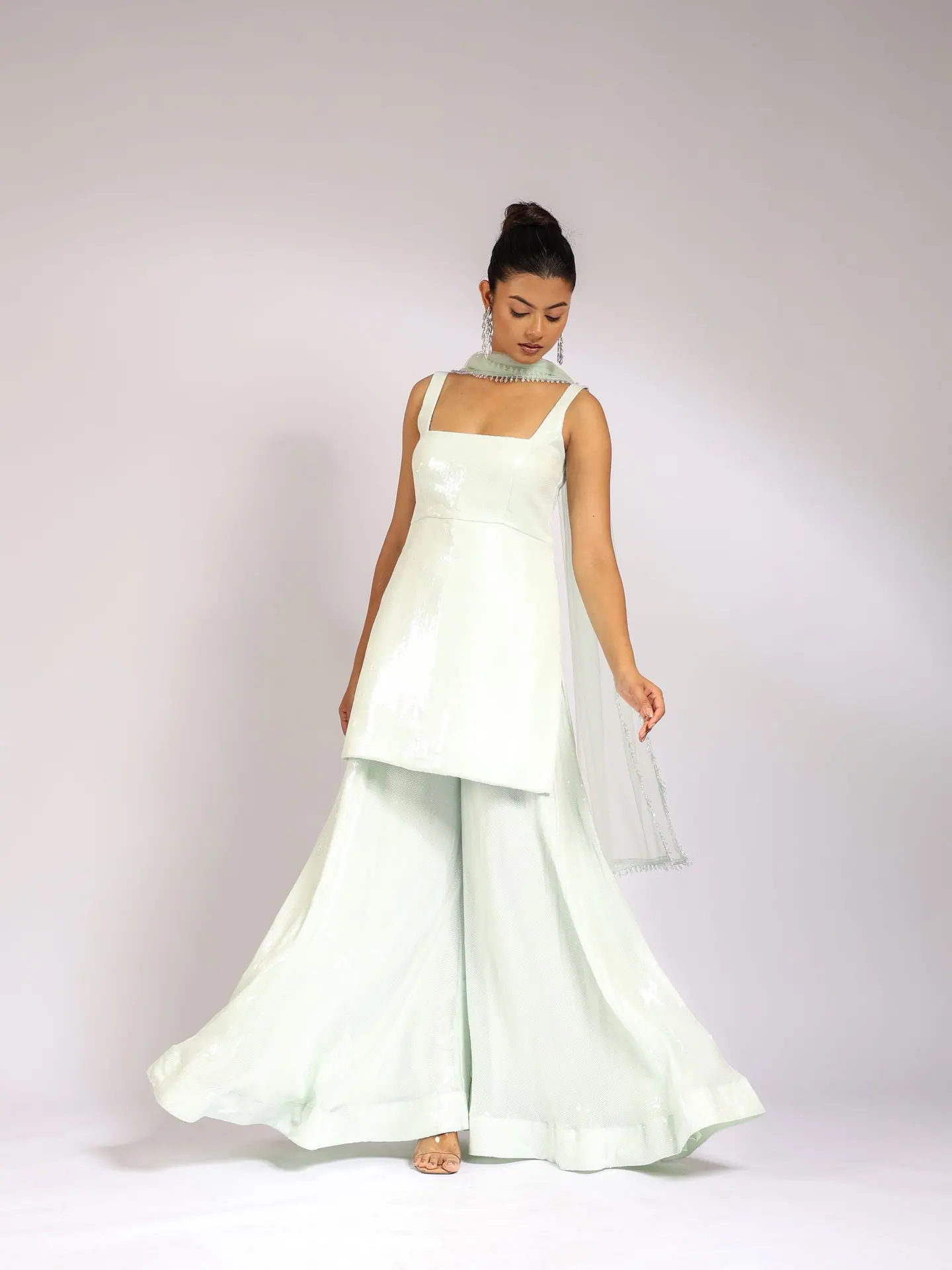 Mint sleeveless kurta with flared sharara and sheer dupatta, full length