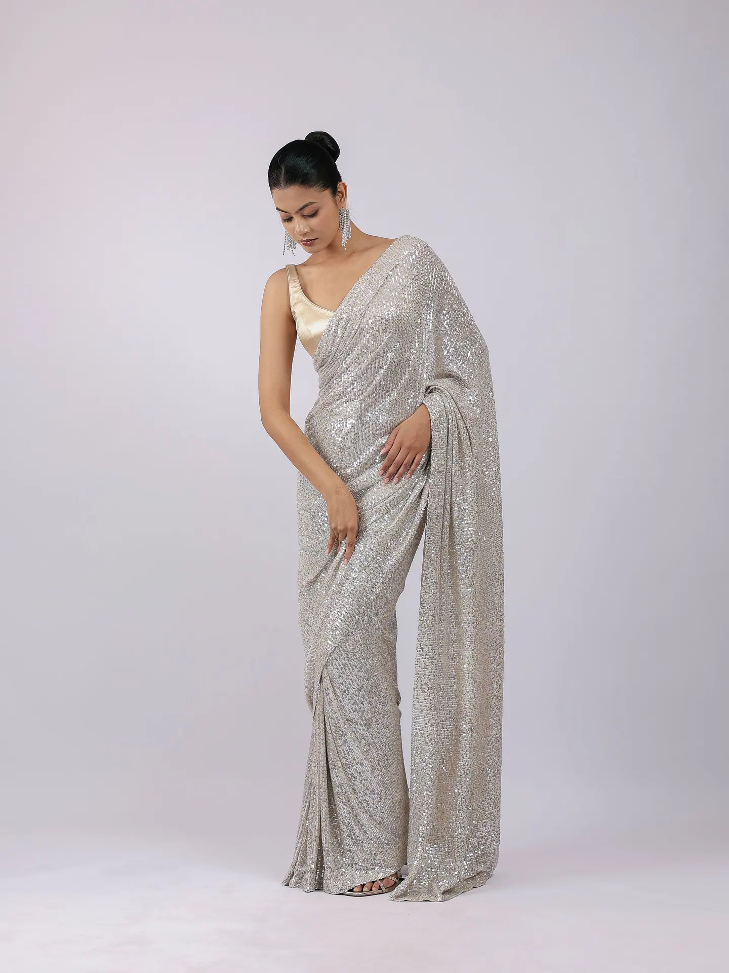 Silver sequin saree with a champagne satin blouse, full length