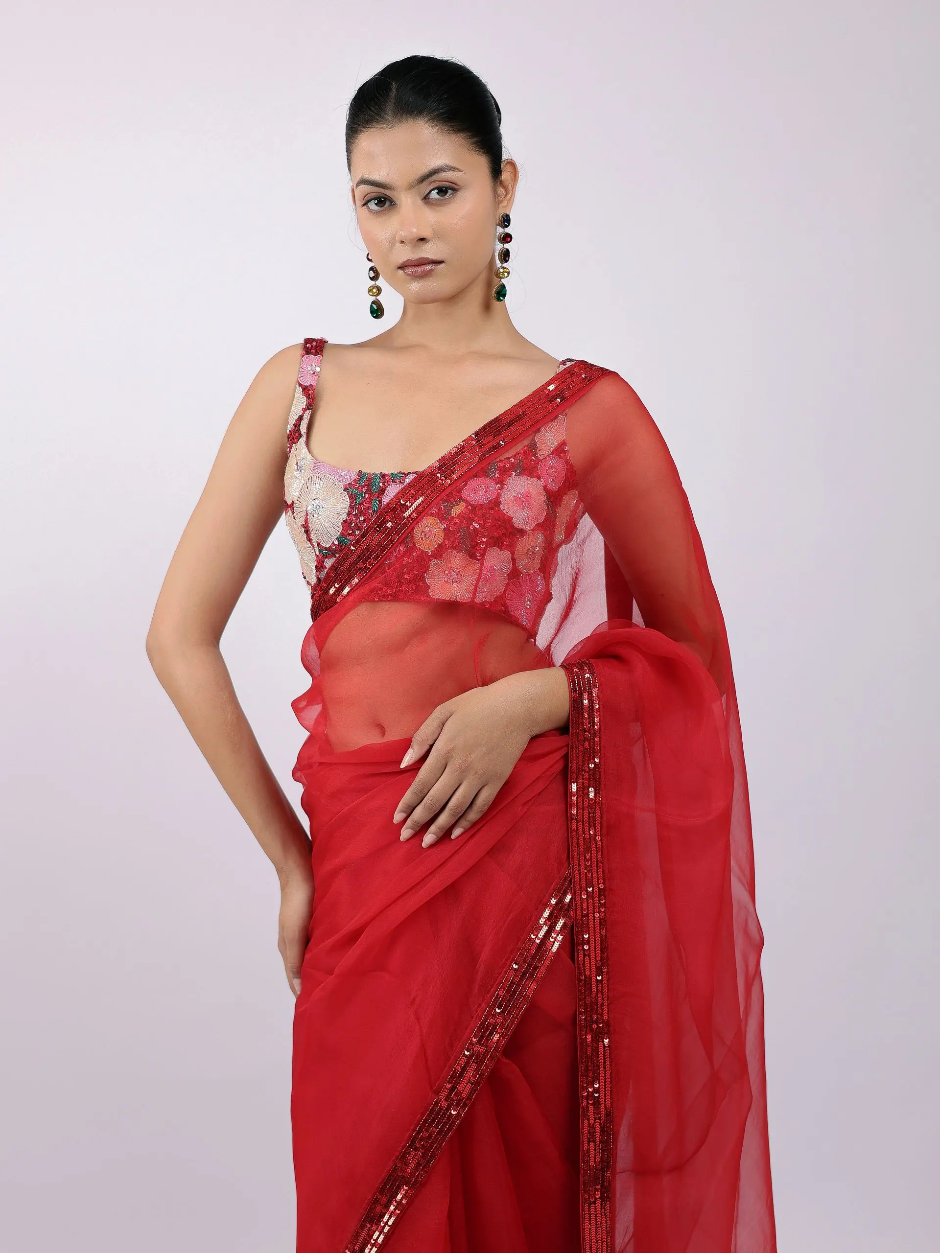 Red organza saree, close portrait over the shoulder
